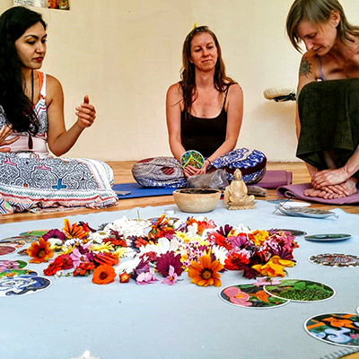 athena-naia-guzman-poole-womens-retreat colourful flowers and leaves in a bowl